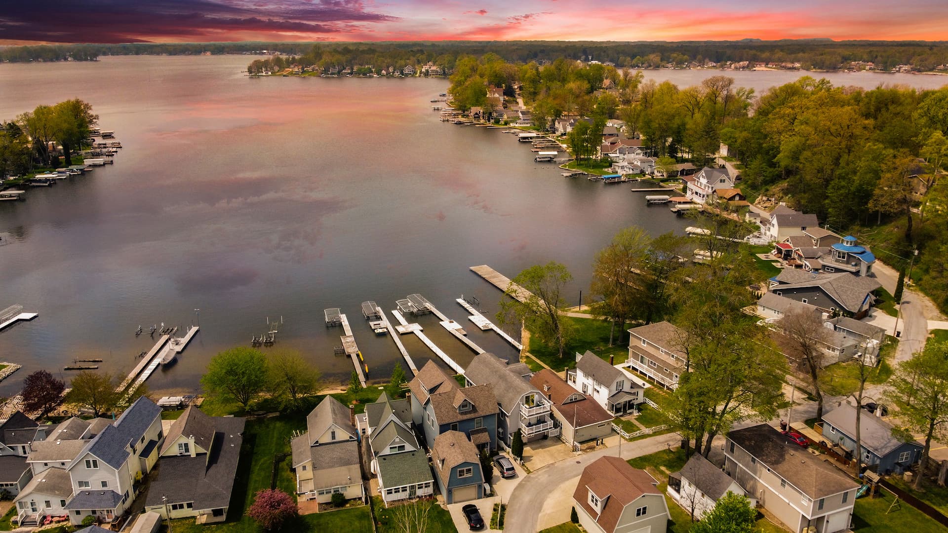 Picture of a lake from high up. Sky showing along the top